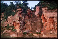 Da Fo (Grand Buddha) and two guardians seen from the river. Leshan, Sichuan, China (color)