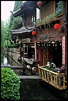 Restaurant across the canal. Lijiang, Yunnan, China (color)
