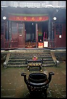 Urn in courtyard inside Xixiangchi temple. Emei Shan, Sichuan, China