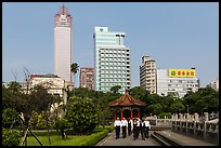 Office workers, 2-28 Peace Park, and high rises. Taipei, Taiwan ( color)