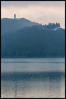 Syuanzang Temple and Tsen Pagoda in dawn mist. Sun Moon Lake, Taiwan (color)
