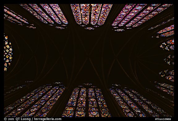 Ceiling and stained glass of Upper Holy Chapel. Paris, France