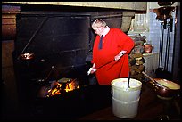 Baking the famous Omelette de la mere Poularde at the eponymous restaurant. Mont Saint-Michel, Brittany, France (color)