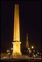 Luxor obelisk of the Concorde plaza and Eiffel Tower at night. Paris, France (color)