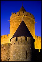 Towers with witch hat roofs by night. Carcassonne, France