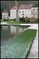 Pond and Abbot's lodging, Fontenay Abbey. Burgundy, France