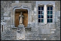 Statue and window, Fontenay Abbey. Burgundy, France (color)