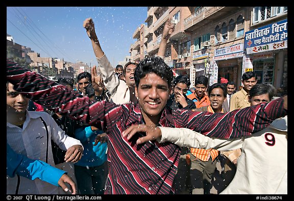 Young men celebrating during wedding procession. Jodhpur, Rajasthan, India