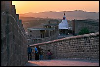Family atop the walls of Mehrangarh Fort at sunset, Mehrangarh Fort. Jodhpur, Rajasthan, India