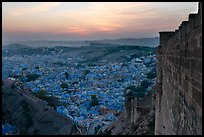 Mehrangarh Fort walls, and old city  blue houses, sunset. Jodhpur, Rajasthan, India