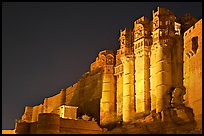Towers and 36m high walls of Mehrangarh Fort by night. Jodhpur, Rajasthan, India