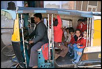 Rickshaw transporting schoolchildren. Jodhpur, Rajasthan, India
