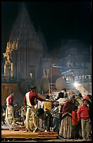 Brahmans giving blessings after evening arti ceremony. Varanasi, Uttar Pradesh, India (color)