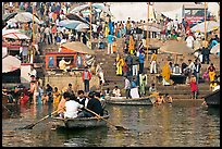Boats and stone steps leading to Ganga River, Dasaswamedh Ghat. Varanasi, Uttar Pradesh, India