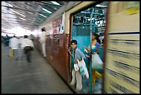 View of departing train with motion blur. Mumbai, Maharashtra, India (color)
