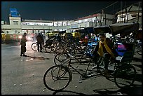 Cycle-rickshaws in front of train station. Agra, Uttar Pradesh, India