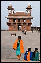 Women, Pachisi courtyard, and Diwan-i-Khas. Fatehpur Sikri, Uttar Pradesh, India (color)