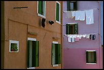 Multicolored houses and hanging laundry, Burano. Venice, Veneto, Italy (color)
