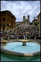 Fontana della Barcaccia and Spanish Steps covered with tourists sitting. Rome, Lazio, Italy ( color)