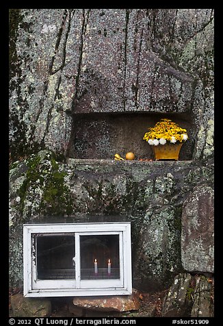Shrine with candles and flowers, Mt Namsan. Gyeongju, South Korea
