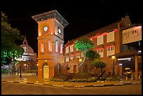 Town Square with Stadthuys, clock tower, and church at night. Malacca City, Malaysia ( color)