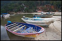 Small boats beached in a lagoon in fishing village, Boca de Tomatlan, Jalisco. Jalisco, Mexico (color)