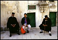 Copt monks and pilgrim in the Ethiopian Monastery. Jerusalem, Israel