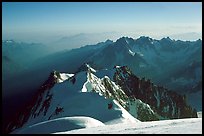 Mount Maudit, Mont-Blanc du Tacul and Aiguille du Midi seen from summit of Mont-Blanc, France. (color)