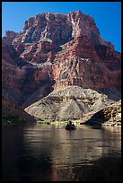 Raft below towering butte. Grand Canyon National Park, Arizona