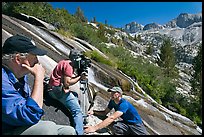 Crew filming a waterfall, lower Dusy Basin. Kings Canyon National Park, California