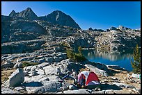 Breaking camp near lake, Dusy Basin. Kings Canyon National Park, California (color)