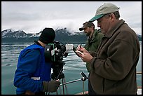 Team begins filming a movie sequence. Glacier Bay National Park, Alaska, USA. (color)