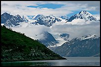 Peaks of Fairweather range with clearing clouds. Glacier Bay National Park, Alaska, USA. (color)