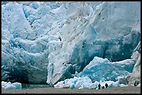 People at the base of Reid Glacier. Glacier Bay National Park, Alaska, USA.