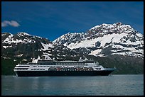 Cruise ship and snowy peaks. Glacier Bay National Park, Alaska, USA.