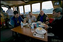 Passengers eating a soup for lunch. Glacier Bay National Park, Alaska, USA. (color)