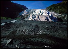 Dark glacial plain floor and Exit Glacier. Kenai Fjords National Park, Alaska, USA. (color)