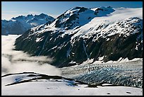 Peaks, glacier, and sea of clouds, morning. Kenai Fjords National Park, Alaska, USA. (color)