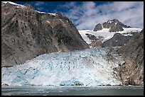 Northwestern tidewater glacier and steep cliffs, Northwestern Fjord. Kenai Fjords National Park, Alaska, USA.