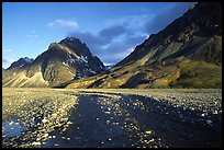Wide gravel river bar below the Telaquana Mountains, sunset. Lake Clark National Park ( color)