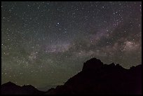 Starry sky and Milky Way above Chisos Mountains. Big Bend National Park ( color)