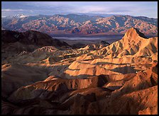 Badlands, Valley, and Telescope Peak from Zabriskie Point, winter sunrise. Death Valley National Park, California, USA. (color)
