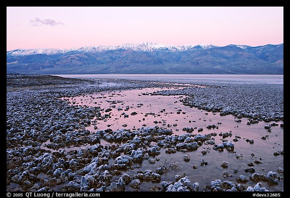 Pond and salt formations, Badwater, dawn. Death Valley National Park, California, USA.