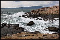Wave, Schoodic Point, and Cadillac Mountain. Acadia National Park, Maine, USA.