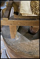Corn being grinded into flour, Mingus Mill, North Carolina. Great Smoky Mountains National Park, USA.