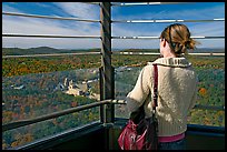 Tourist looking at the view from Hot Springs Mountain Tower in the fall. Hot Springs National Park, Arkansas, USA. (color)