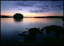 Kabetogama lake sunset with eroded granite and tree-covered islet. Voyageurs National Park, Minnesota, USA. (color)