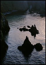 Rocks and ocean, Cathedral Cove, Anacapa, late afternoon. Channel Islands National Park, California, USA.