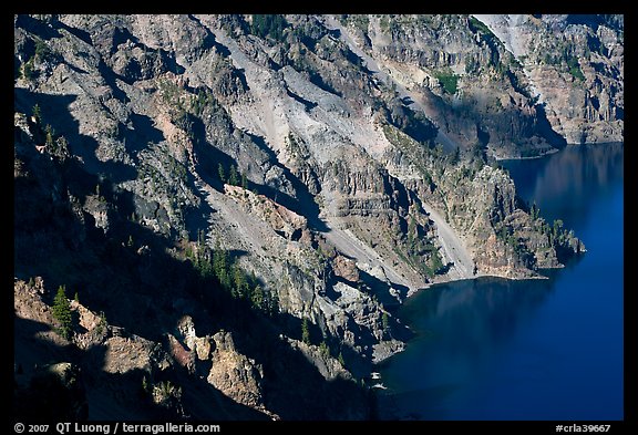 Volcanic cliffs below Hillman Peak, afternoon. Crater Lake National Park, Oregon, USA.