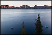Tour boats and south rim at sunset, Cleetwood Cove. Crater Lake National Park ( color)